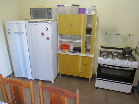 Fridge, stovetop, cookware/dishes/utensils