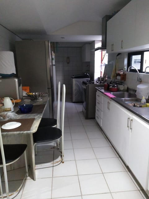 Fridge, blender, cookware/dishes/utensils