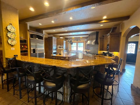 Kitchen Bar area
Fully stocked kitchen for cooking and serving 26 guests