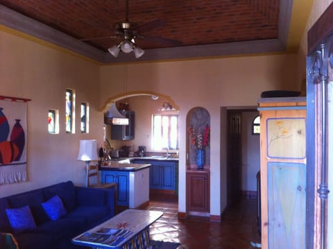 Living room with 'cupula' ceiling with fan