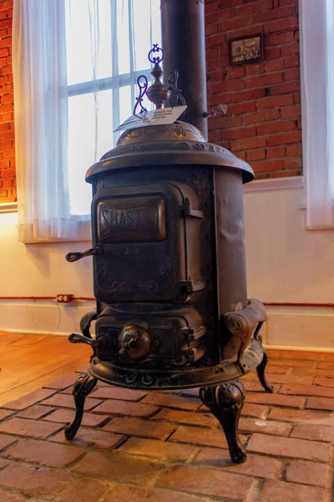 Original antique wood burning fireplace (non-functional)