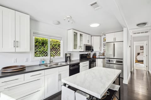 Kitchen in open floor plan. Well-appointed with everything for the chef!