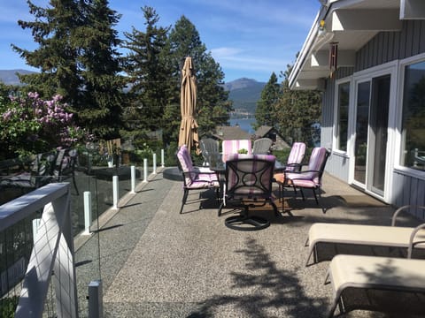 Lovely deck overlooking lake and mountains, large umbrella for shade if needed.
