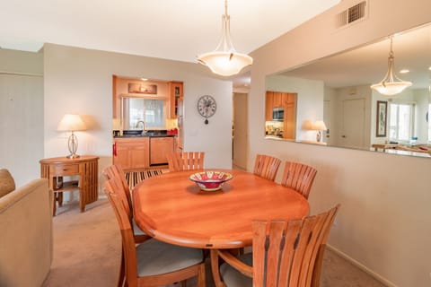 Teak dining room set for 6 that opens to accommodated 8. Chairs in patio closet