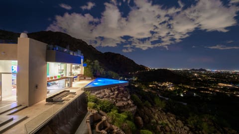 Immaculate nighttime view of Camelback Visa on Camelback Mountain w/ city views 