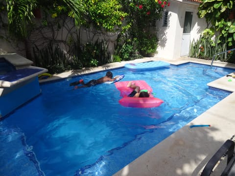 A heated pool, a waterfall pool