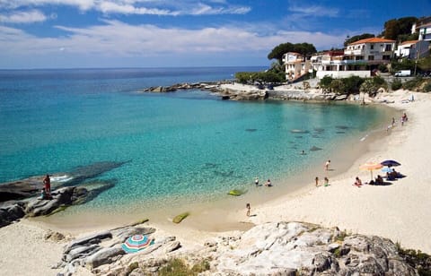 On the beach, sun loungers