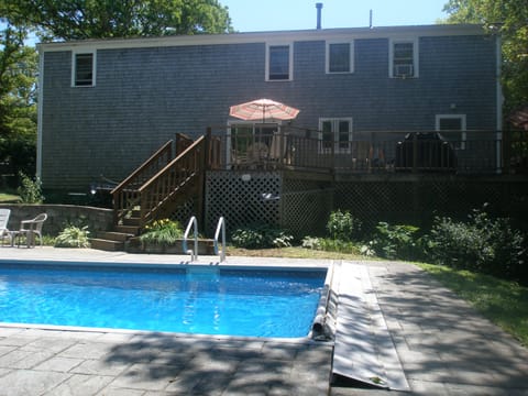 A heated pool, sun loungers