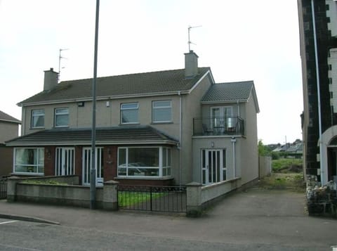 Front view of house. Semi detached, Mullaghard is on the right.