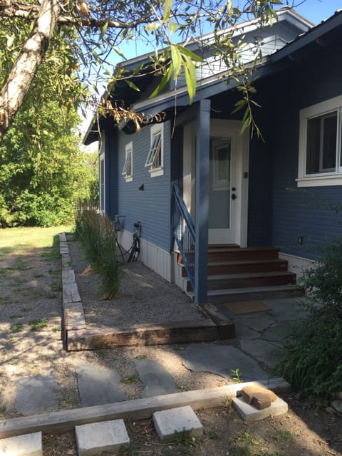 side entrance, by driveway / off-street parking.