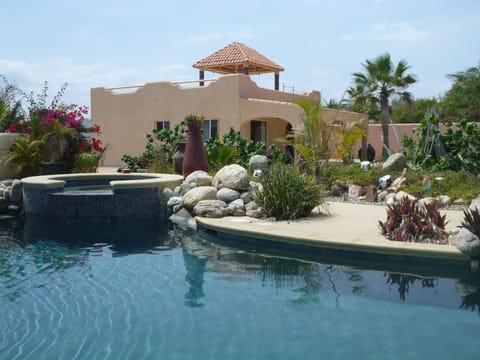 Sparkling pool and jacuzzi next to your beach getaway casa.