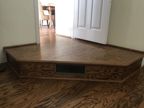 Small step down from dining area into master bedroom.