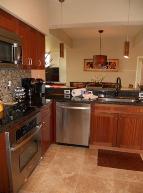 Newly remodeled kitchen which has stainless steel appliances and granite.