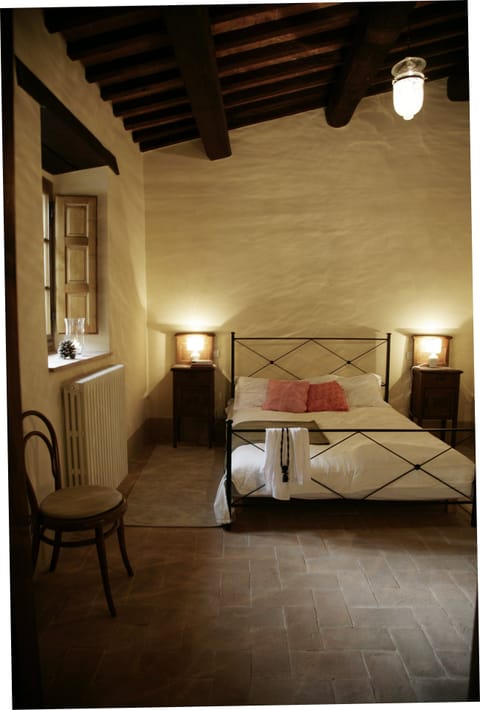 Bedroom 1 with view towards the castle. Castello di Montegiove. Leccino
