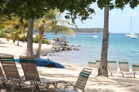 On the beach, sun loungers, beach towels