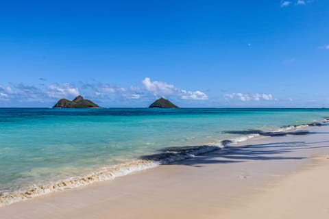 On the beach, sun loungers, beach towels