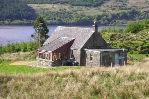 Finchairn Cottage set on a secluded hill side with far reaching views.