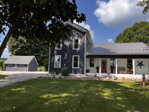 Our 190 year old home is across the driveway. And yes, we live here.