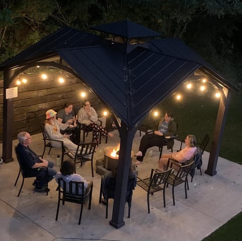 Returning Guests enjoying upgraded fire pit! (Photo taken at our other home)