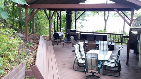 Deck overlooks Stone Lake-large roof,  gas+charcoal grills,  seating for 25.