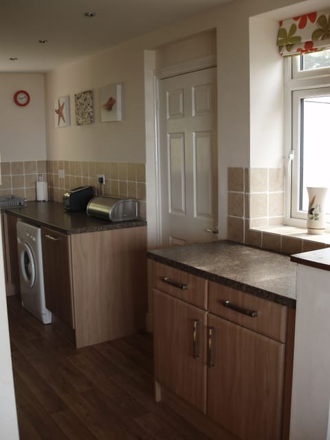 Integrated washing machine and dishwasher.