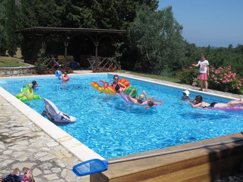Three-generation family party enjoying the pool July 2016.

