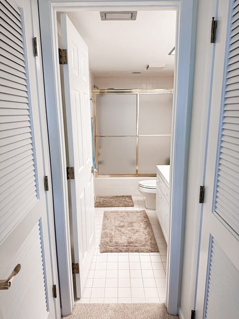 Combined shower/tub, hair dryer, towels, toilet paper