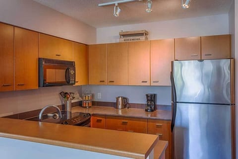 Galley kitchen with all appliances and many extra amenities
