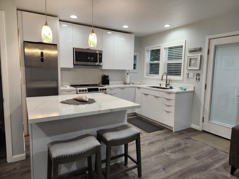 Kitchen with built in island with seating for 4
