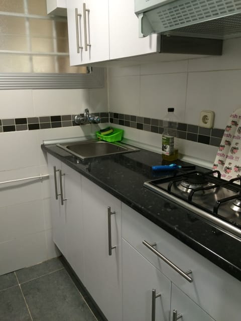 Fridge, microwave, cookware/dishes/utensils