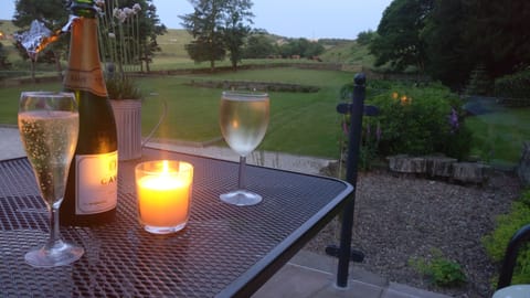 Enjoy a glass of fizz as the sun goes down on your private patio.