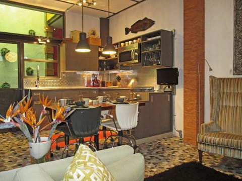 Another angle of the kitchen with outdoor laundry area.