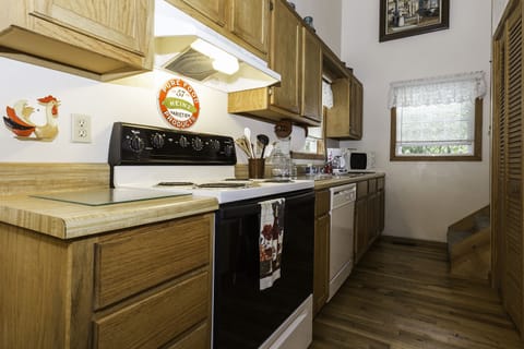 kitchen, stove, dishwasher,
coffee pot, microwave,