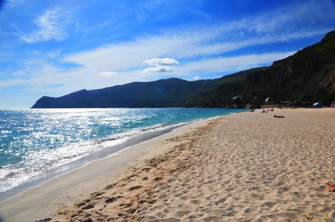 Beach nearby, sun loungers