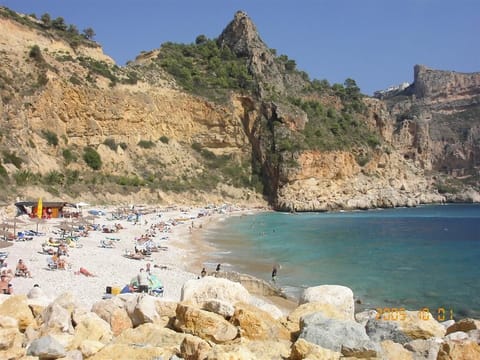 Beach nearby, sun loungers