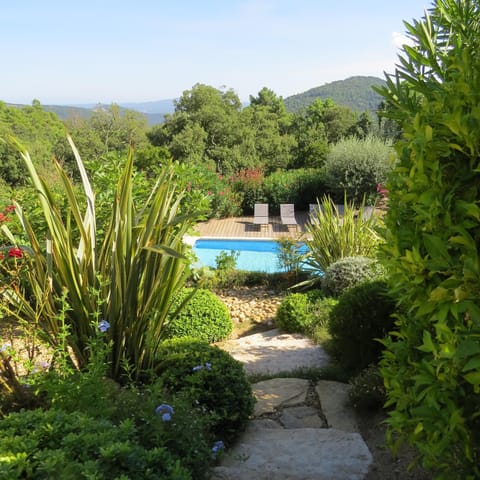 Outdoor pool, a heated pool, sun loungers