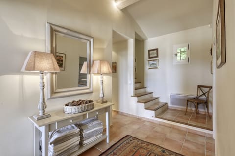Inner Hall with stairs up to the Master Bedroom and passage to Bedrooms 2 and 3