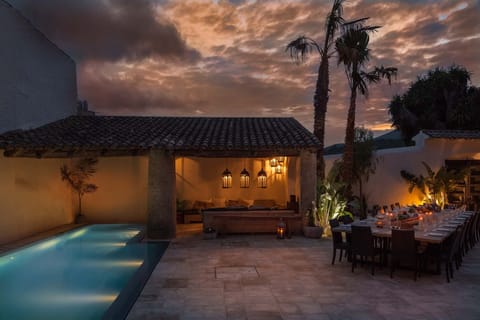 Outdoor pool, an infinity pool, sun loungers