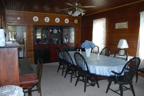 Dining Room. With upright antique piano