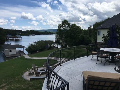 View from upper veranda. Showing fire pit and walkway down to the dock.