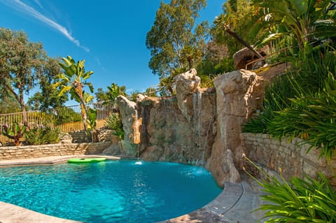 The waterfall is 13 ft high & the pool is 13 ft. deep.