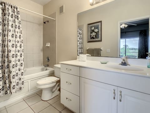 Combined shower/tub, hair dryer, towels, toilet paper