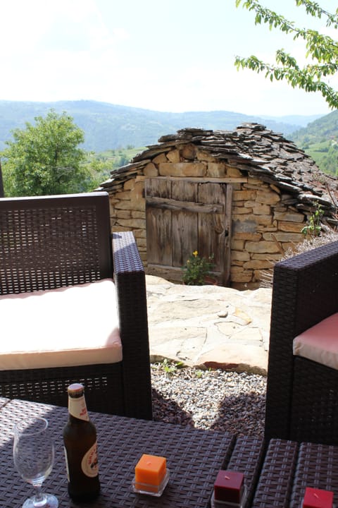 Enjoying a drink outside the apartment