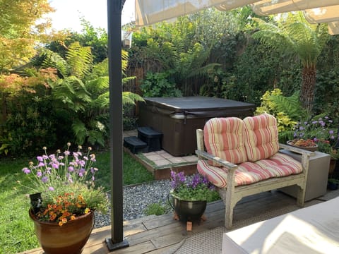 6 person hot tub in our beautiful backyard with fire pit & heat lamp