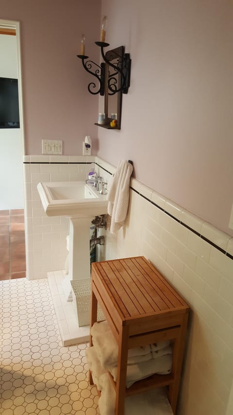 Combined shower/tub, hair dryer, towels, soap