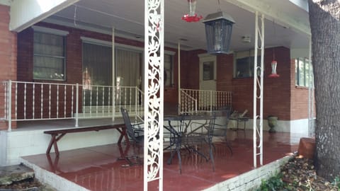 Eat outside and enjoy the hummingbirds or watch the family splash in the Frio.