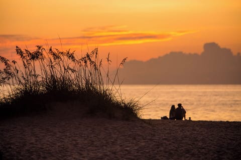 On the beach, sun loungers, beach towels