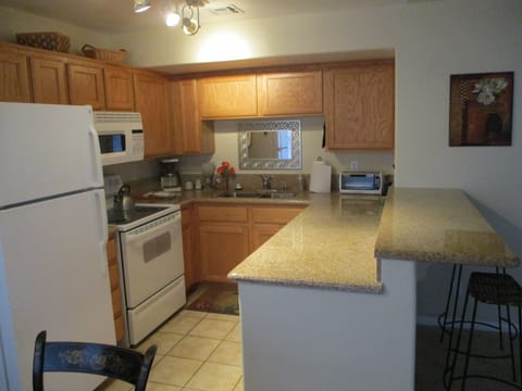 Kitchen featuring granite counters