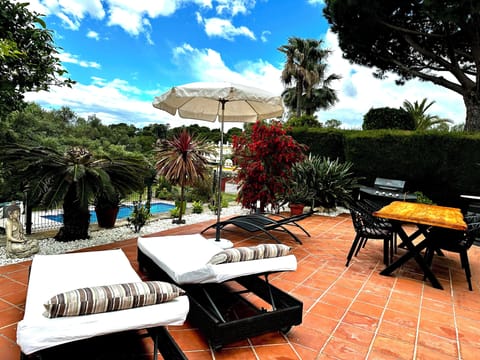 Large outside terrace overlooking the community pool