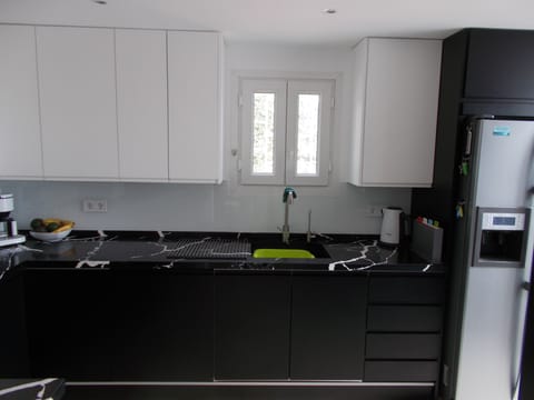 Our stunning new German kitchen with all new appliances and American fridge.